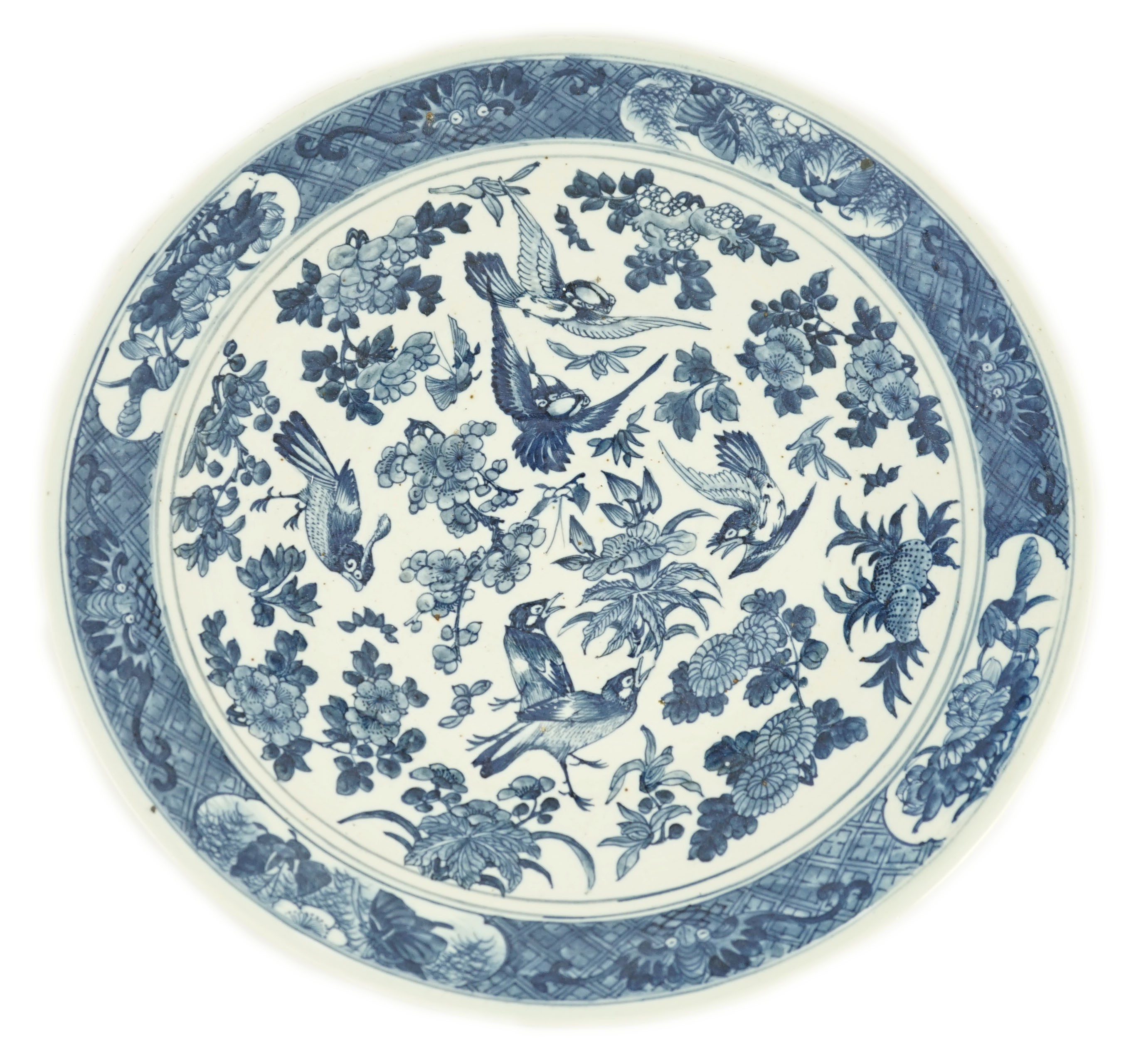 A Chinese blue and white 'blackbird' dish, 19th century, 37.3cm diameter, small glaze chips